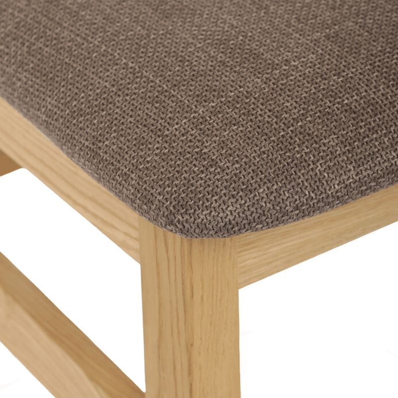 Drevená jedálenská stolička vo farbe dub čalúnená hnedou látkou